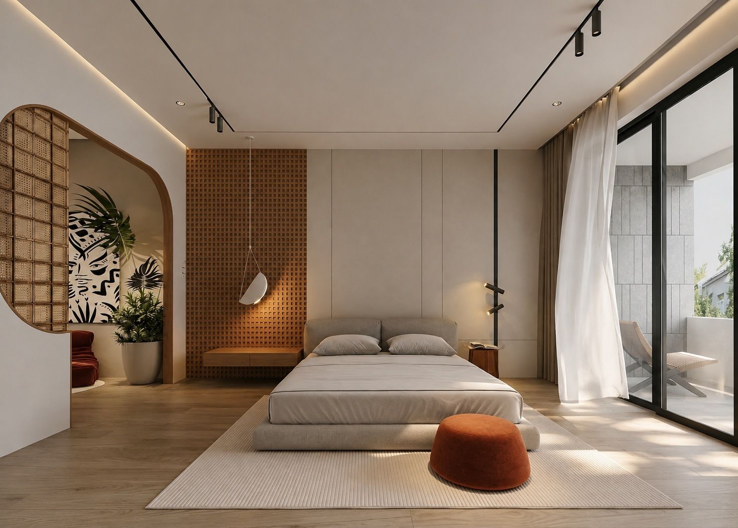 Master bedroom with a low bed, rattan screen arch and sheer curtains
