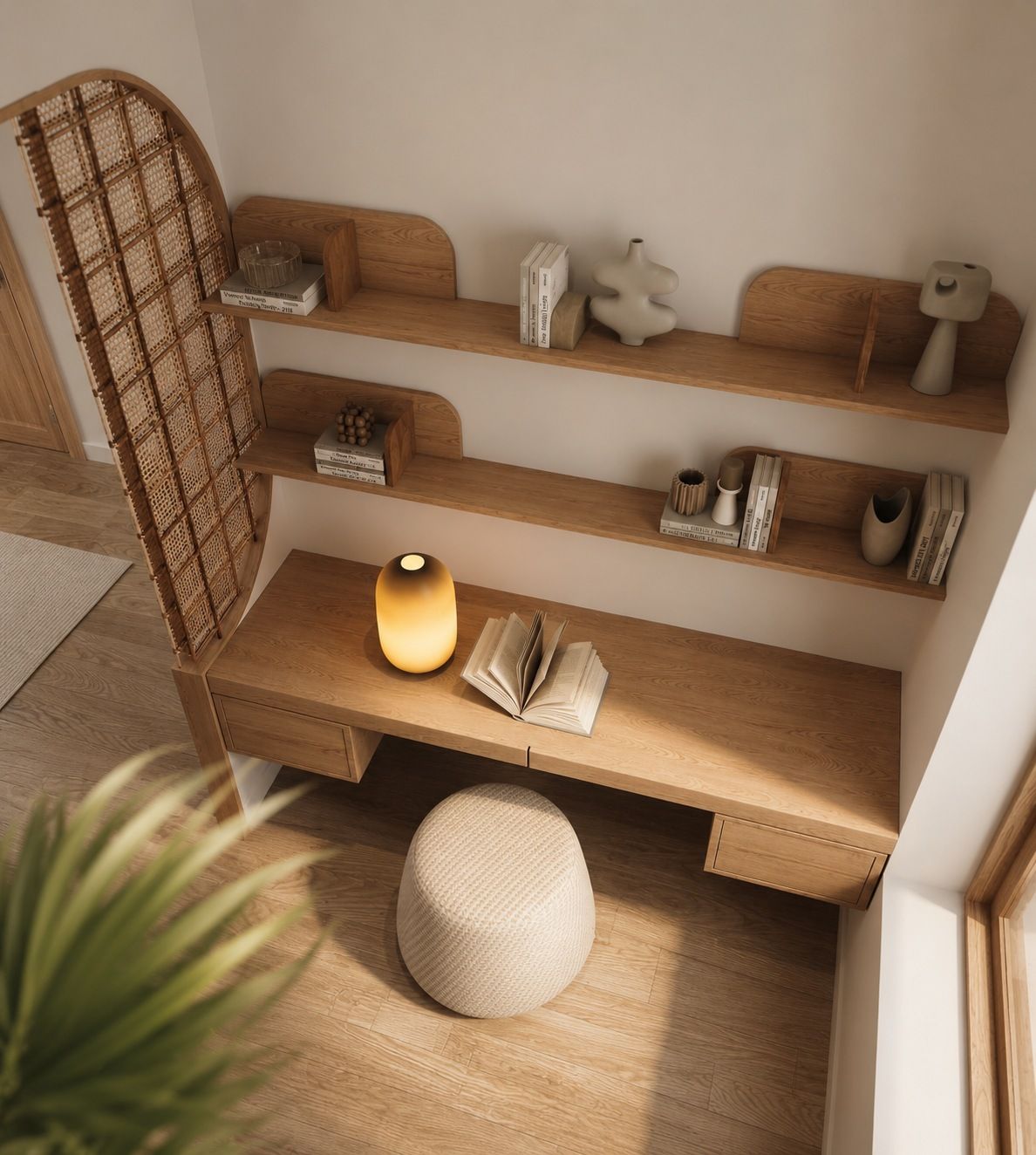 Built-in oak desk and shelves with a glowing lamp, seen from above